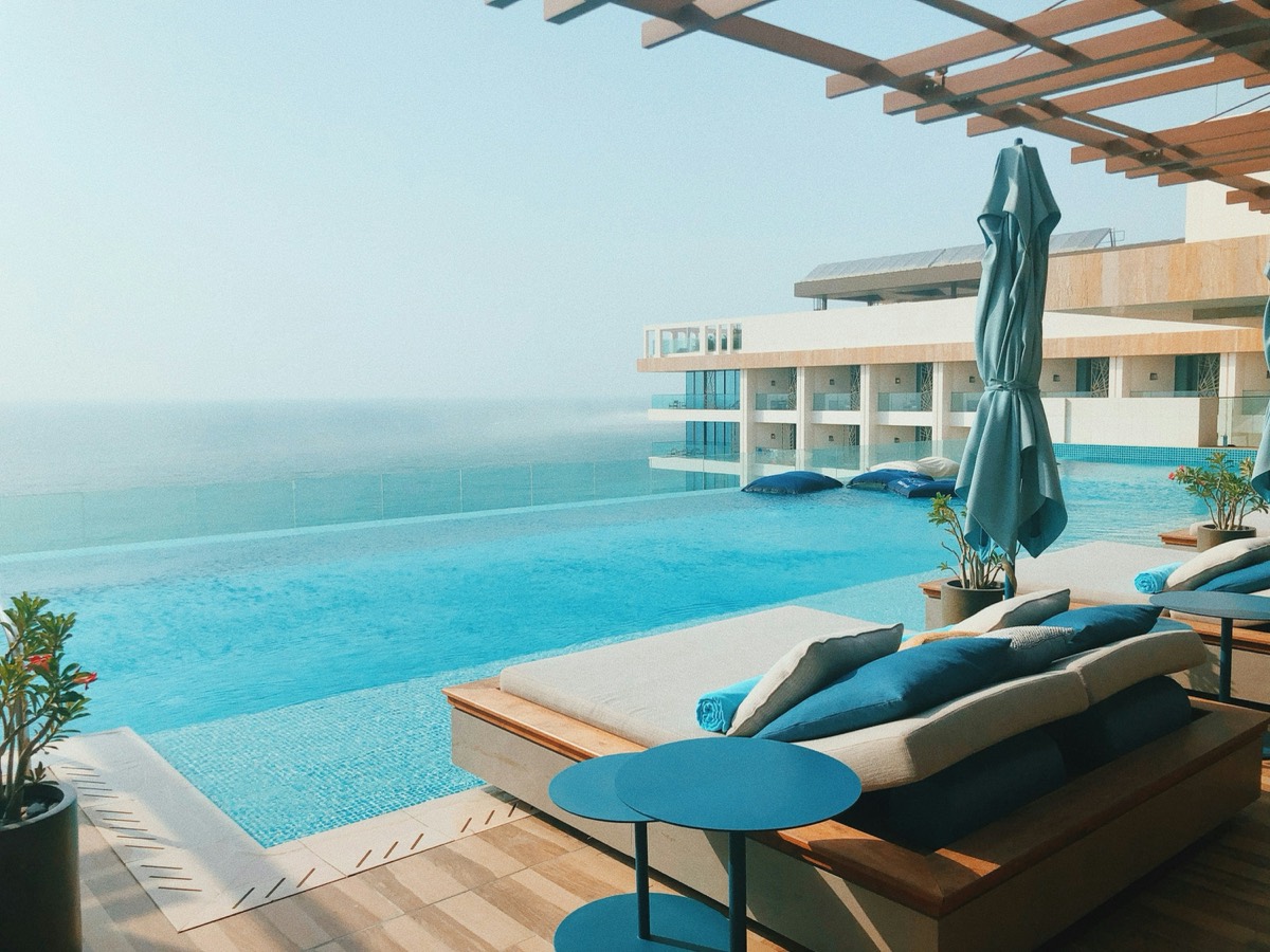 A terrace with an infinity pool overlooking the ocean.